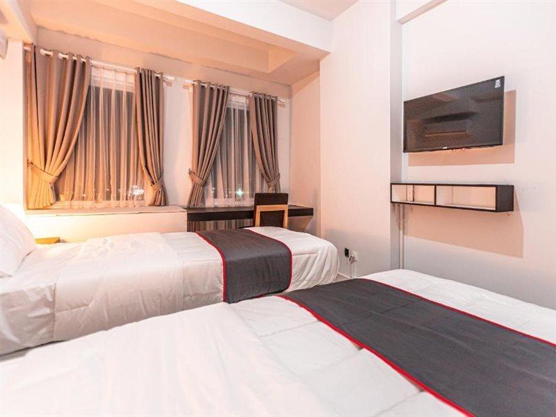 Capital O Urbano Hotel Bekasi Exterior photo